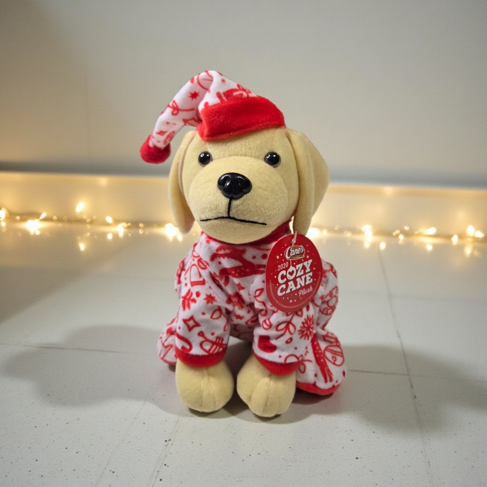 Raising canes collectible Red and White Holiday Dog Plush In PJs NWT